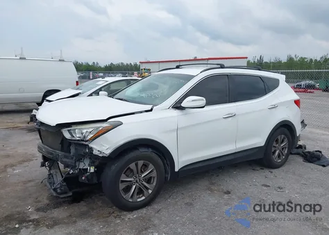 2014 Hyundai Santa Fe Sport 2.4L z USA, uszkodzony, nr VIN 5XYZU3LB9EG229255